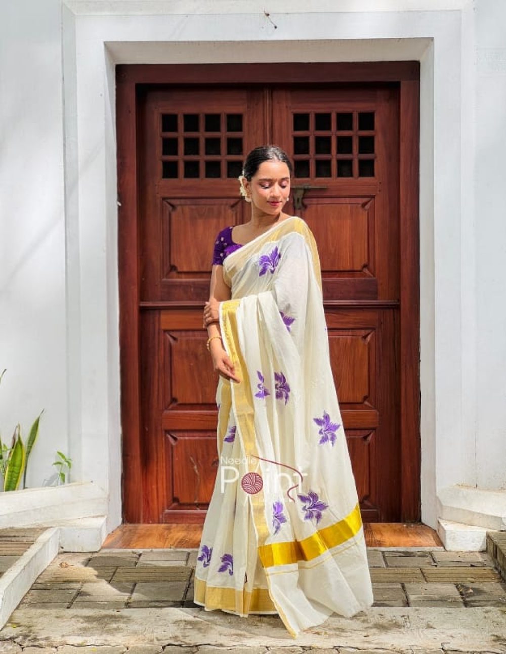 Kerala Cotton Saree with Purple Floral Embroidery