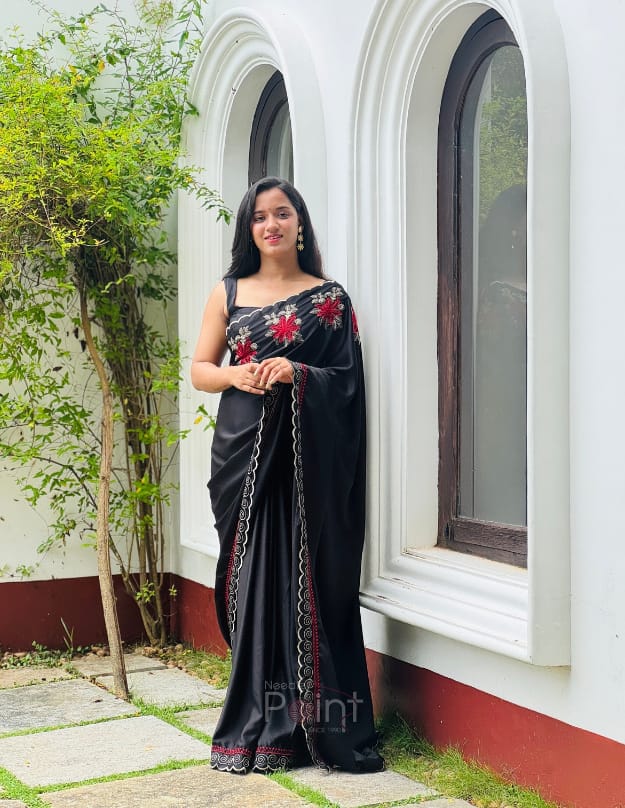 Classic Black Saree Featuring Red Floral Embroidery Design