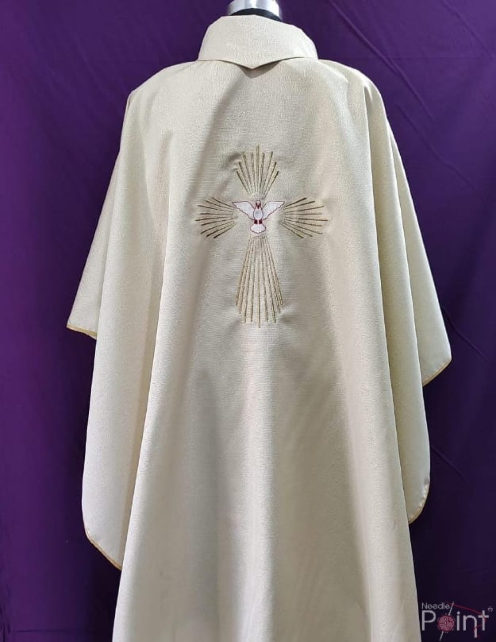 Cream chasuble back view with Holy Spirit dove and cross embroidery on purple background Catholic vestment Needle Point