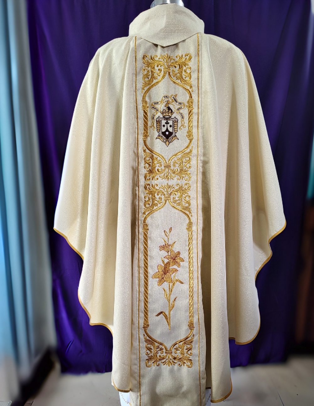 Back view of golden chasuble with coat of arms and floral lily embroidery – vestment India – Needle Point