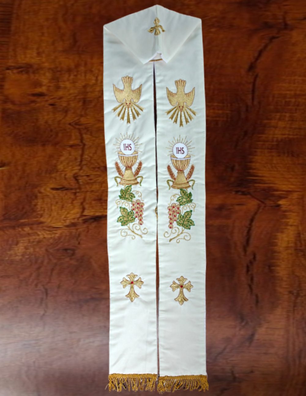 (flat lay view) Cream priest stole with Holy Spirit, IHS chalice & grapevine embroidery – flat lay view